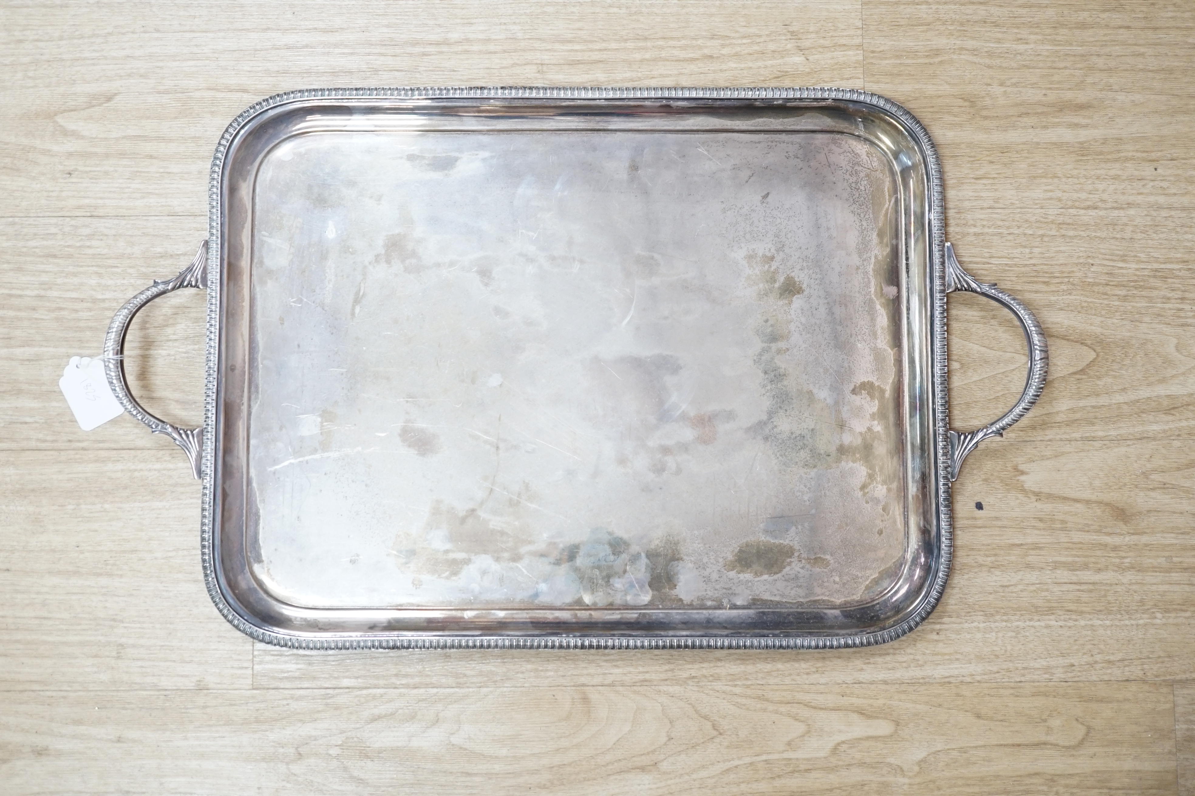 A Elizabeth II silver rectangular two handed tea tray, by James Dixon & Sons, Sheffield, 1958, 69cm, 109.1oz.